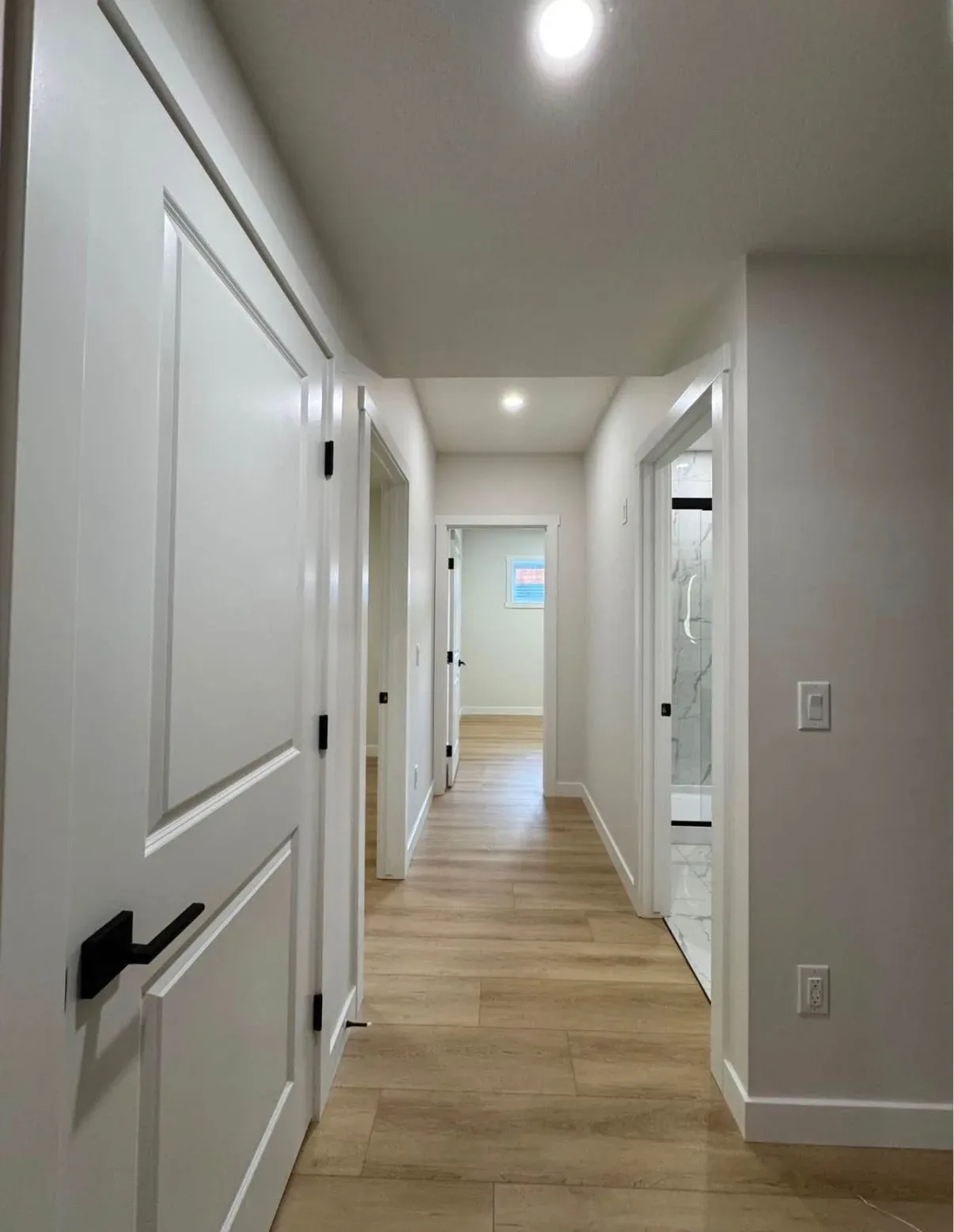 Flooring installation Luxury vinyl plank (LVP) in a Calgary home.
